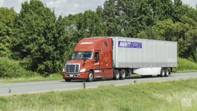 A red Averitt tractor pulling a 53-foot dry van trailer