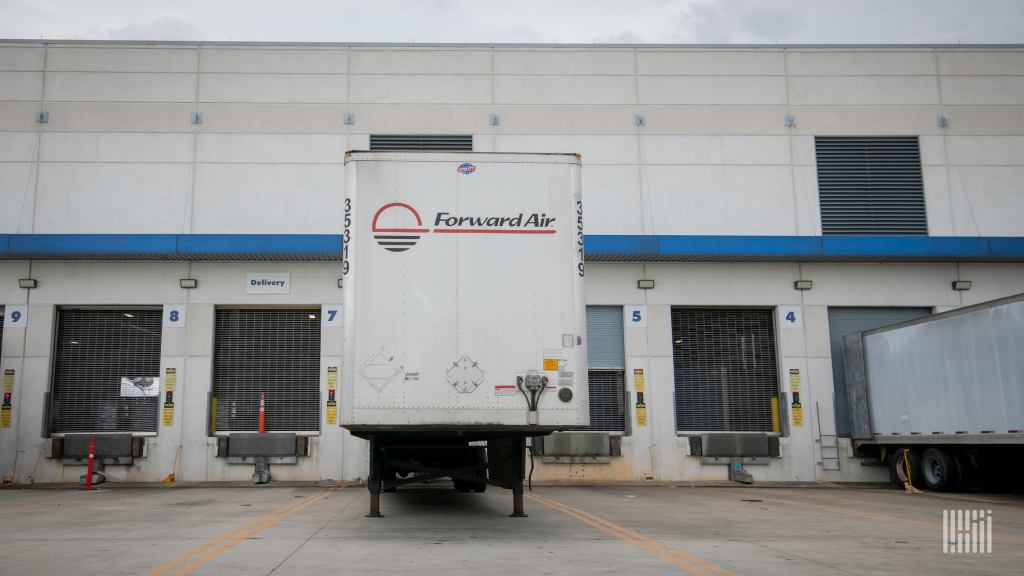 A white Forward Air trailer at a terminal