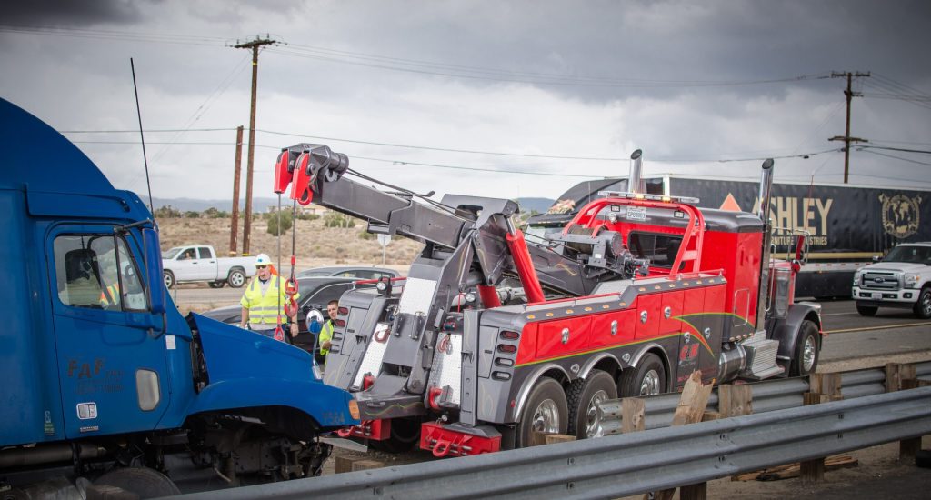 Truck being towed from accident scene