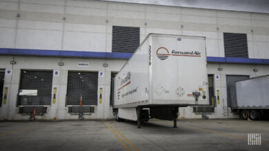A white Forward Air trailer at a warehouse