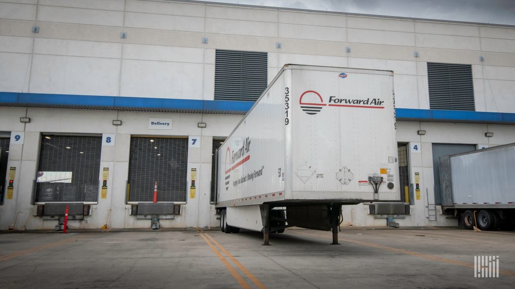 A white Forward Air trailer at a warehouse