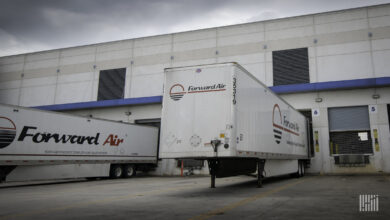 White Forward Air trailers at a loading dock