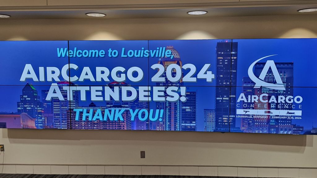 Blue sign for AirCargo 2024 conference