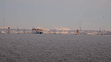 The collapsed section of the Francis Scott Key Bridge in Baltimore is seen more clearly after daybreak. (Photo: StreamTime Live/YouTube)