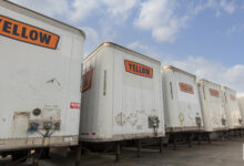 Yellow trailers parked at a terminal in Houston