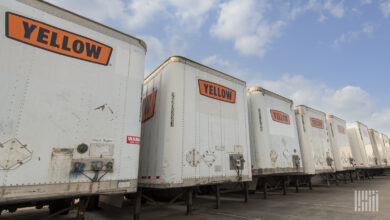 Yellow trailers parked at a terminal in Houston