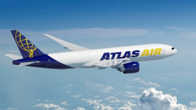 A blue-tailed Atlas Air jet high above the clouds.