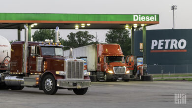 Trucks filling up with diesel fuel.