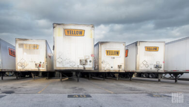 Several Yellow trailers at a terminal