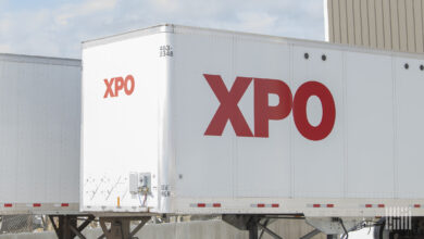 A white XPO trailer at a terminal