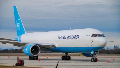 A light-blue tailed Maersk Air Cargo jet on the ground.