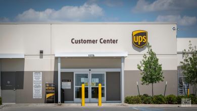 Photo of a the front entrance to a UPS Customer Service building.