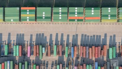 An overhead view of containers and chassis at a rail yard