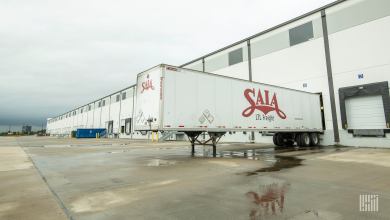 A white Saia trailer at a warehouse