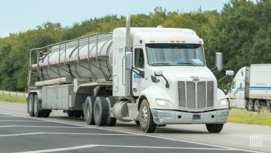 A KAG tractor pulling a tank trailer