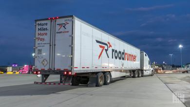 A Roadrunner trailer being pulled into a truckstop