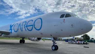 Close up photo near front of GlobalX Cargo plane.