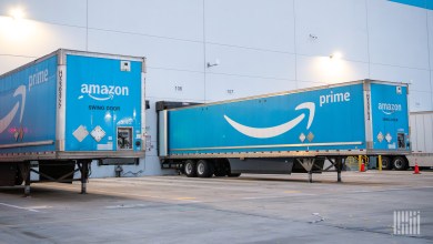 Blue Amazon trailers at a distribution center
