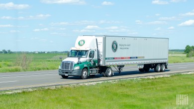 An Old Dominion truck and trailer on highway