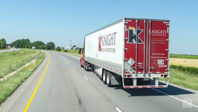 The back of a Knight Transportation trailer on a highway
