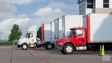 Tractors and trailers loading at a warehouse