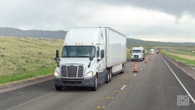 Tractor-trailers moving on a single-lane highway