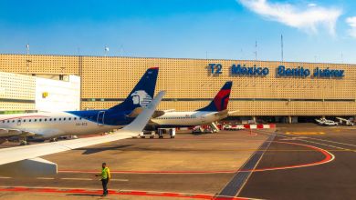 Aeromexico and Delta jets at a passenger terminal in Mexico City.