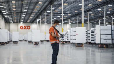 An employee working on a GXO warehouse floor