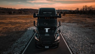 Torc Robotics Level 4 autonomous Freightliner truck on rural road at sunset, highlighting driverless safety advancements in partnership with Edge Case Research.