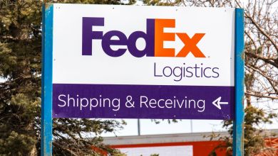 Close up of a purple/orange FedEx Logistics sign.