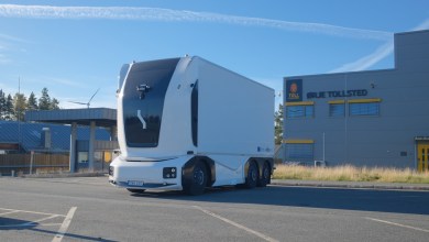 Einride's cabless electric autonomous truck parked at Ørje Customs during the world's first driverless border crossing between Sweden and Norway.