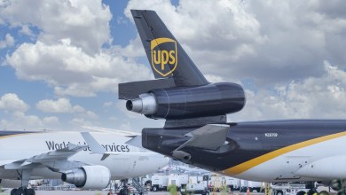 Close-up of brown tail of a UPS cargo jet. The MD-11 has an engine in the tail.