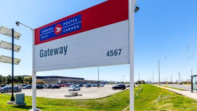 Entrance sign for a large Canada Post processing center.
