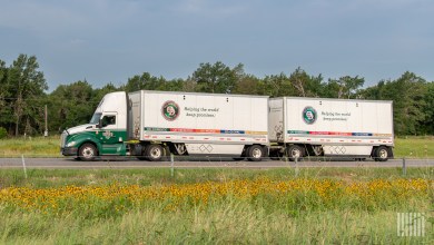 An Old Dominion tractor pulling two LTL trailers on a highway