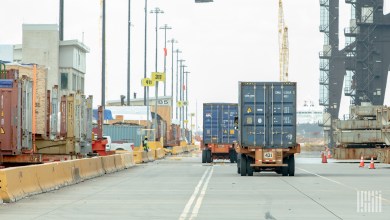 ocean containers on chassis being moved at a port