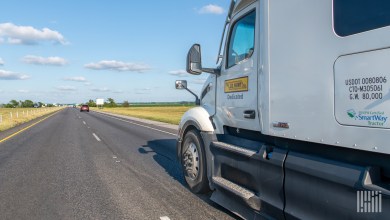 Closeup of a JB Hunt dedicated sleeper cab on a highway