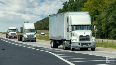 multiple tractors on a highway
