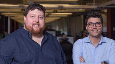 Drew McElroy (left) and Jonathan Salama (right), co-founders of Transfix, pose for a portrait in an office setting.