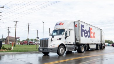 FedEx Freight tractor pulling two LTL trailers