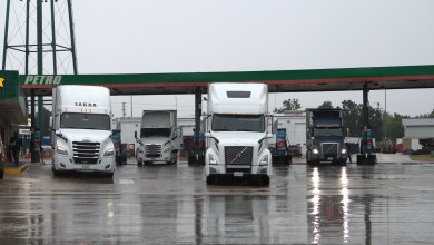multiple trucks at a truckstop