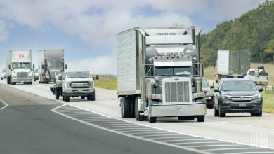 multiple trucks on a highway
