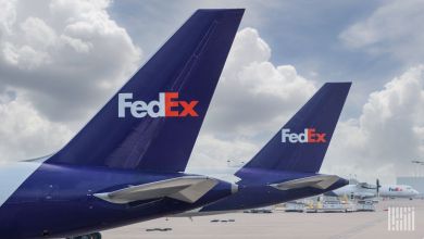 Close view of FedEx purple tails on jet aircraft.
