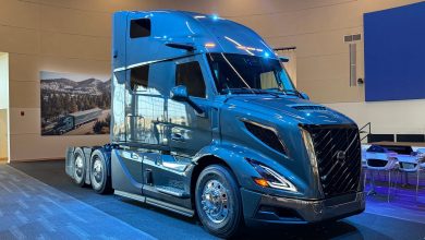lue Volvo VNL semi-truck on display inside the Volvo Customer Center, showcasing the modern trucks receiving new unattended over-the-air software updates