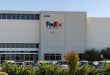 Front view of a FedEx Supply Chain Services warehouse.