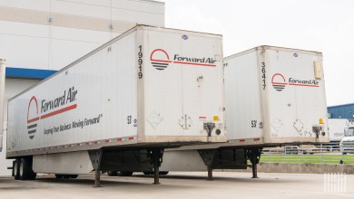 two Forward Air trailers parked at a loading dock