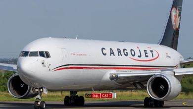 Close up front-facing view of a Cargojet freighter with maple leaf logo on tail.