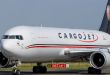 Close up front-facing view of a Cargojet freighter with maple leaf logo on tail.