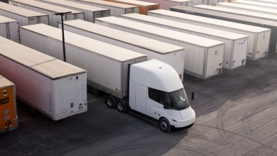 Tesla Semi truck in a freight yard among rows of trailers, part of Einride’s planned 500-truck deployment