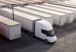 Tesla Semi truck in a freight yard among rows of trailers, part of Einride’s planned 500-truck deployment