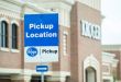 A Kroger pickup location sign is displayed outside a brick building.